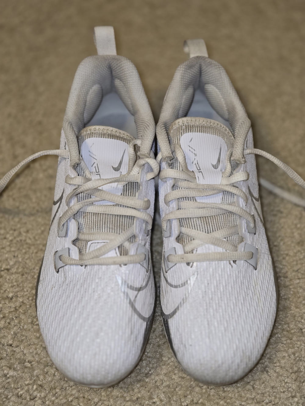 Nike Vapor Edge Speed 360 2 football cleats, specifically in the "White/Metallic